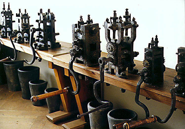 Coinage at the Český Krumlov Castle, exposition of contemporary minting machines